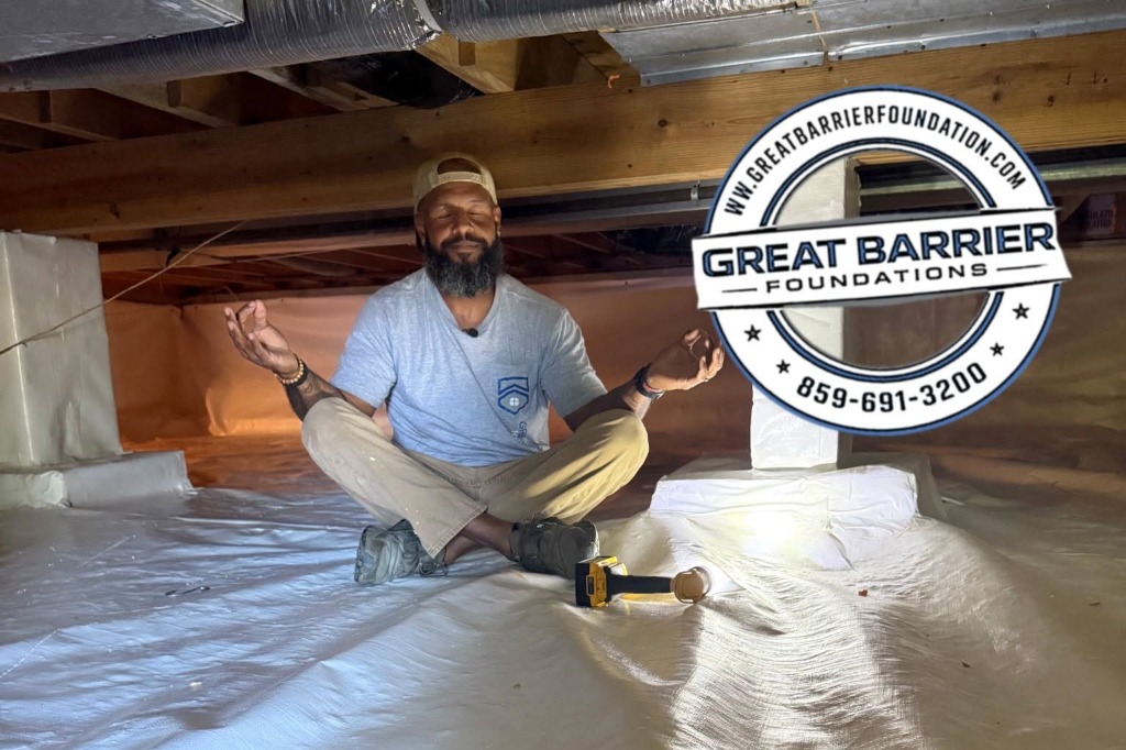 Brian Grantlin meditating in an encapsulated crawl space