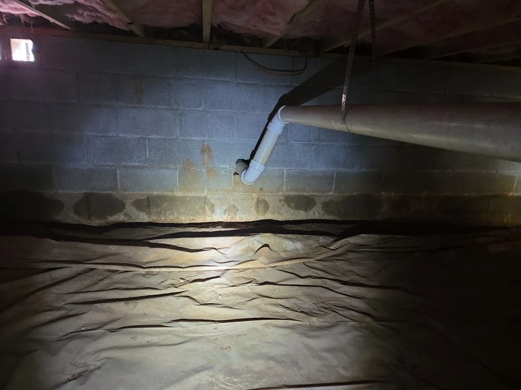 Grimey unsealed crawlspace with waterline in Somerset KY before repair